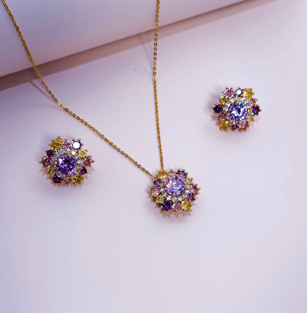 Gold flower jewelry set with pink and yellow crystal pendant necklace and matching stud earings - Qute Boutique Qatar