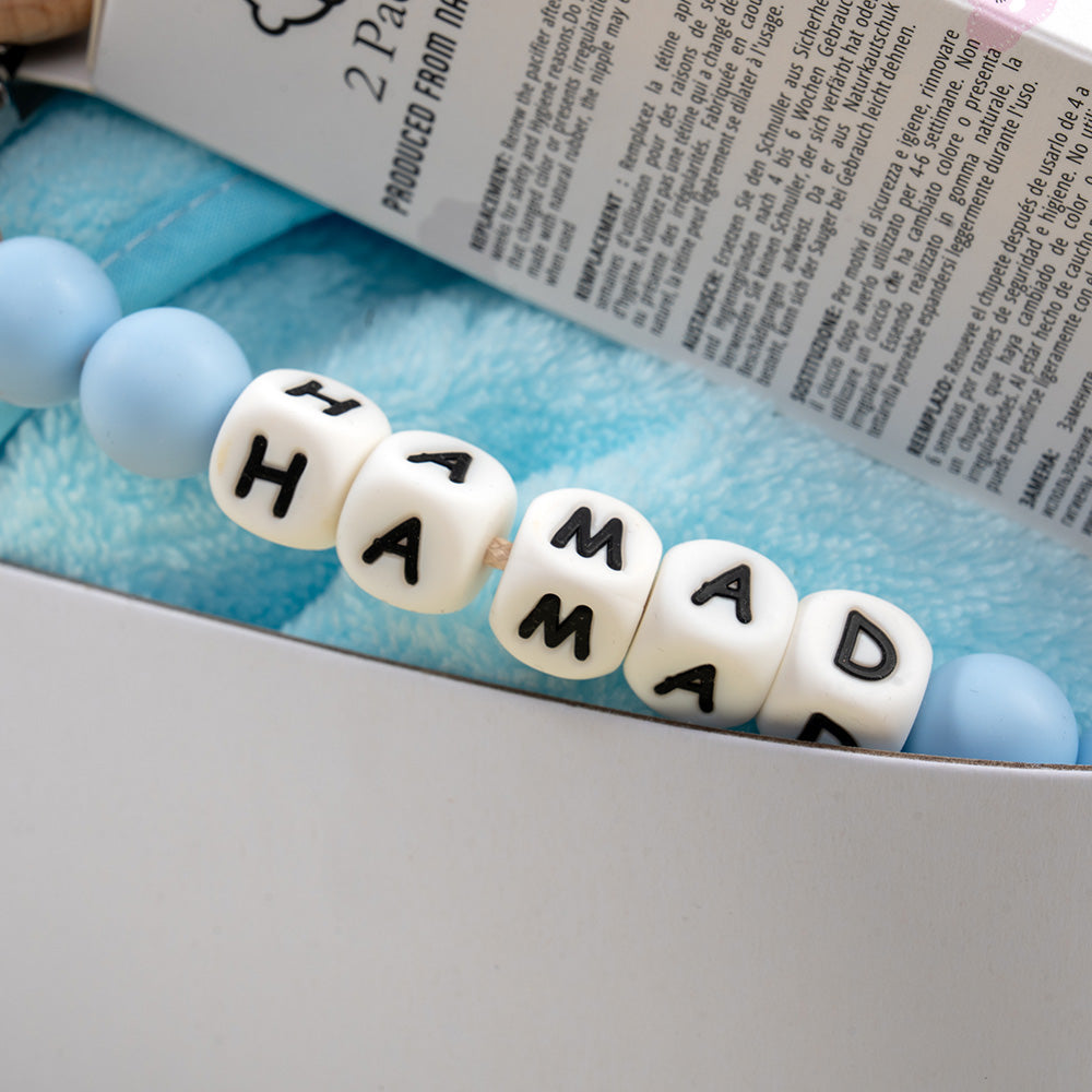Plaza Hollandi x Qute personalized baby boy gift set with wooden milestone keepsake plaque and plush bunny in Doha Qatar