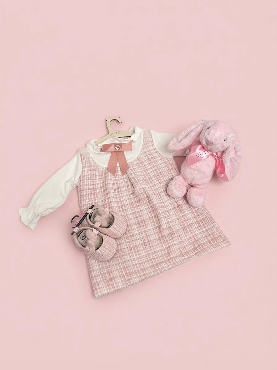 Luxury first birthday baby girl gift set in a clear presentation bag by Qute Qatar, featuring a 12-18 months pink tweed dress, matching shoes, and a plush pink bunny for delivery in Doha.